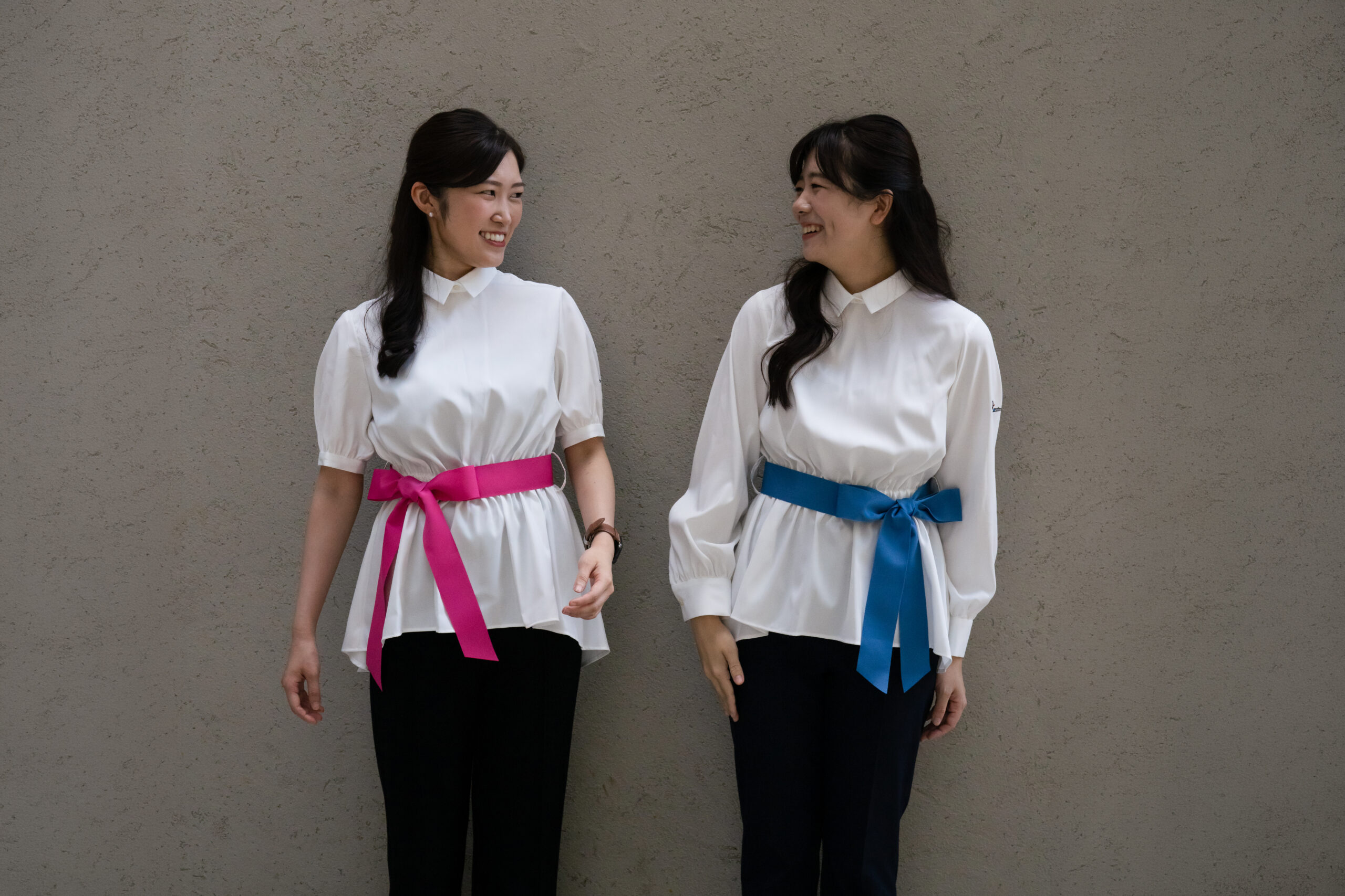 musicoのスタッフユニフォームを着た先生の女性